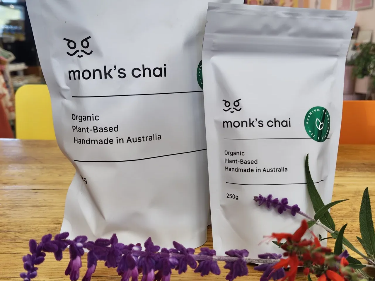 Monk&rsquo;s Chai organic plant-based blend bags on a timber bench