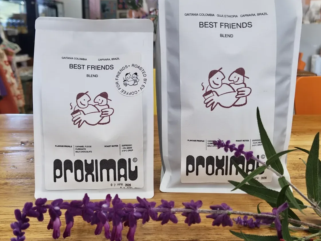 Proximal Coffee Best Friends Blend bags on a timber bench